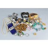 A QUANTITY OF COSTUME JEWELLERY, to include tigers eye bead necklace, simulated pearls, soapstone