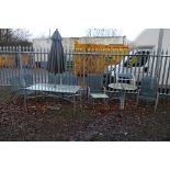 A METAL AND GLASS RECTANGULAR GARDEN TABLE, with four chairs, two loungers, parasol, two d end