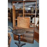 A VICTORIAN LACQUERED CIRCULAR OCCASIONAL TABLE (sd), an open bookcase, with a central fall front