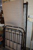 A VICTORIAN CAST IRON AND BRASS THREE FOOT BED FRAME, with an Ikea mattress