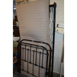 A VICTORIAN CAST IRON AND BRASS THREE FOOT BED FRAME, with an Ikea mattress