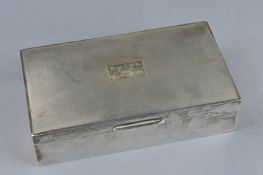 A SILVER CIGARETTE BOX