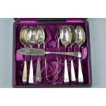 A CASED SET OF SIX SILVER SPOONS, tongs and butter knife, Glasgow 1900 (8)