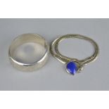 A LAPIS LAZULI SILVER NECKLACE, hallmarked Klein 925, the central irregular oval cabochon cut