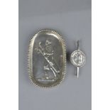 AN EDWARDIAN NOVELTY SILVER PIN TRAY, embossed with golfer and golf caddy, London 1902, Anglo