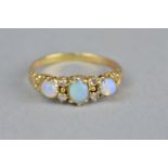 A VICTORIAN PRECIOUS OPAL AND DIAMOND YELLOW GOLD (UNMARKED) RING, (assessed as 18ct gold), three