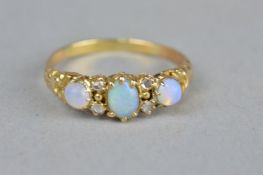 A VICTORIAN PRECIOUS OPAL AND DIAMOND YELLOW GOLD (UNMARKED) RING, (assessed as 18ct gold), three