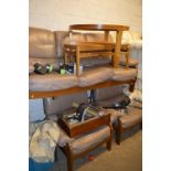 A MID CENTURY TEAK AND LEATHER THREE PIECE LOUNGE SUITE