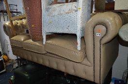 A BEIGE LEATHER CHESTERFIELD SOFA