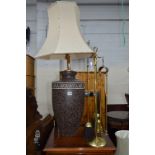 A BRASS FOUR PIECE COMPANION SET, large table lamp and two other table lamps (4)