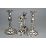 TWO PAIRS OF PLATED CANDLESTICKS