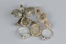 AN EARLY 20TH CENTURY SILVER BROOCH, a silver locket, marcasite ring and orchid brooch and a