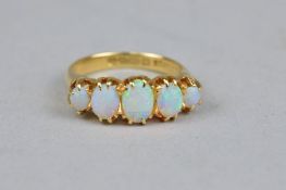 A MID 20TH CENTURY HALF HOOP OPAL RING, opals graduating in size, ring size N, hallmarked 18ct gold,