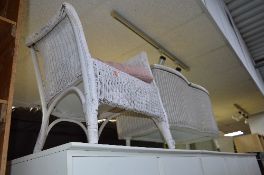 A WICKER CHAIR, and ottoman (2)