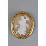 A CAMEO YELLOW/ROSE METAL BROOCH, depicting dancing Grecian figure, bezel set with rope twist border