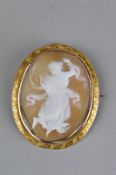 A CAMEO YELLOW/ROSE METAL BROOCH, depicting dancing Grecian figure, bezel set with rope twist border