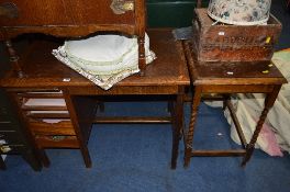 AN OAK DESK WITH LIFT AND SLIDE DOOR WITH FIVE DRAWERS