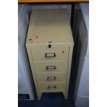 A SMALL METAL FOUR DRAWER OFFICE CABINET