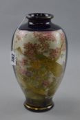 AN ORIENTAL SATSUMA VASE, decorated with Peacock and mountains and ducks on a pond, approximate