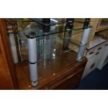 A CLEAR GLASS THREE TIER T V STAND