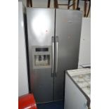 A WHIRLPOOL AMERICAN STYLE FRIDGE FREEZER