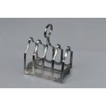 A GEORGE V SILVER TOAST RACK OF OGEE FORM, James Dixon & Sons, Sheffield 1918, approximate gross