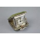 AN ART DECO SILVER AND SHAGREEN CASED TRAVEL CLOCK, Birmingham 1936, makers SSM, square silvered