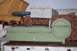 A GREEN UPHOLSTERED ART DECO STYLE DAY BED, an upholstered sewing box and a leather footstool