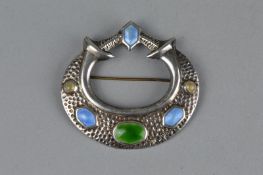 A MID 20TH CENTURY SILVER ENAMELLED BROOCH, the raised oval, circular and hexagonal beige, green and