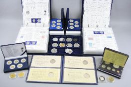 TWO BOXES OF COINS, MEDALS AND COMMEMORATIVES, to include two albums of the Statehood quarters