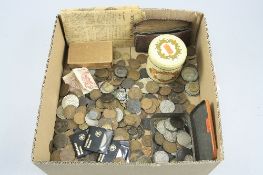 A BOX OF MIXED COINAGE AND COMMEMORATIVES, to include a small tobacco tin of mainly silver coins