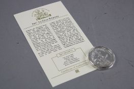 A 2007 1OZ SILVER BRITANNIA, in a coin tray with certificate of authenticity