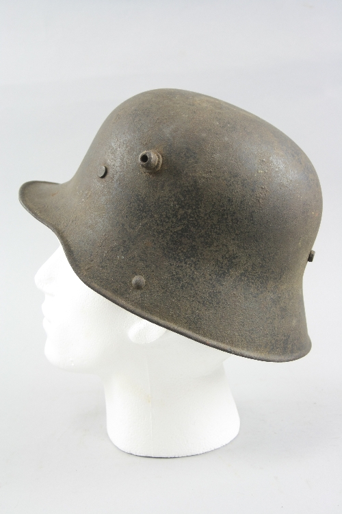 A GERMAN WWI ERA STANHELM STYLE ARMY METAL HELMET, the helmet is slightly rusted, but in overall - Image 2 of 3