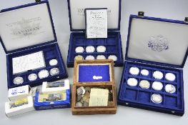 AMOUNTS OF PROOF SILVER COINS, .500 to .999 silver contained in three fitted boxes, some COA's,