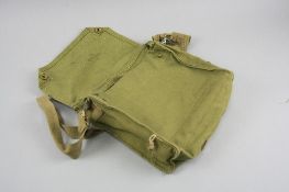A BRITISH WWII CANVAS SHOULDER BAG, approximately 28cm x 25cm x 8cm, marked on the inside flap, with