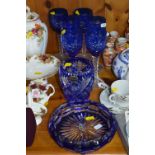 A SET OF SIX BLUE FLASHED CUT GLASSES, together with two pieces Brierglass blue flashed items (8)