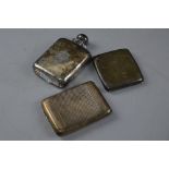 A SILVER FLASK, and two silver cigarette cases, approximate weight 372 grams (3)