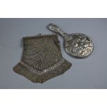 AN EDWARDIAN CHAIN MAIL PURSE, and a silver mirror