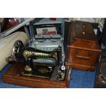 A TABLE TOP SINGER SEWING MACHINE AND A HERMES 2000 TYPEWRITER (2)