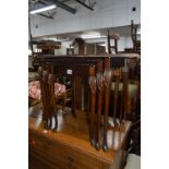 A MODERN MAHOGANY NEST OF THREE TABLES, hardwood bedside unit with a single drawer and a