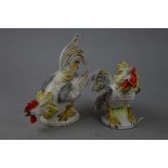 A PAIR OF CONTINENTAL PORCELAIN MODELS OF FIGHTING COCKERELS, impressed '20800 Germany' to base,