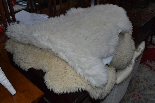 TWO SHEEPSKIN RUGS