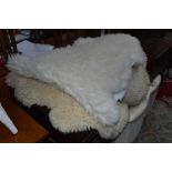 TWO SHEEPSKIN RUGS