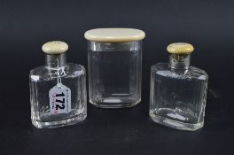 THREE BONE AND SILVER GLASS BOTTLES