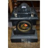 A SLATE AND MARBLE MANTLE CLOCK, with Roman numerals (sd)