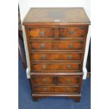 A SMALL MODERN MAHOGANY CHEST, of four small and four long drawers, on bracket feet, approximate