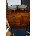 AN ARTS AND CRAFTS MAHOGANY MUSIC CABINET, with five drawers beside a single cupboard door,