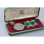 A BOXED WOMENS VOLUNTARY SERVICE MEDAL, un-named, together with small press cutting relating to