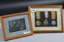 A FRAMED GROUP OF WWI MEDALS, named to S-10753, PTE W.H. LEA. Rifle Brigade, medals are the 1914/