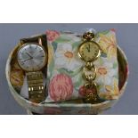 A MID 20TH CENTURY GOLD PLATED LONGINES WATCH, together with a ladies Laura Ashley watch (2)